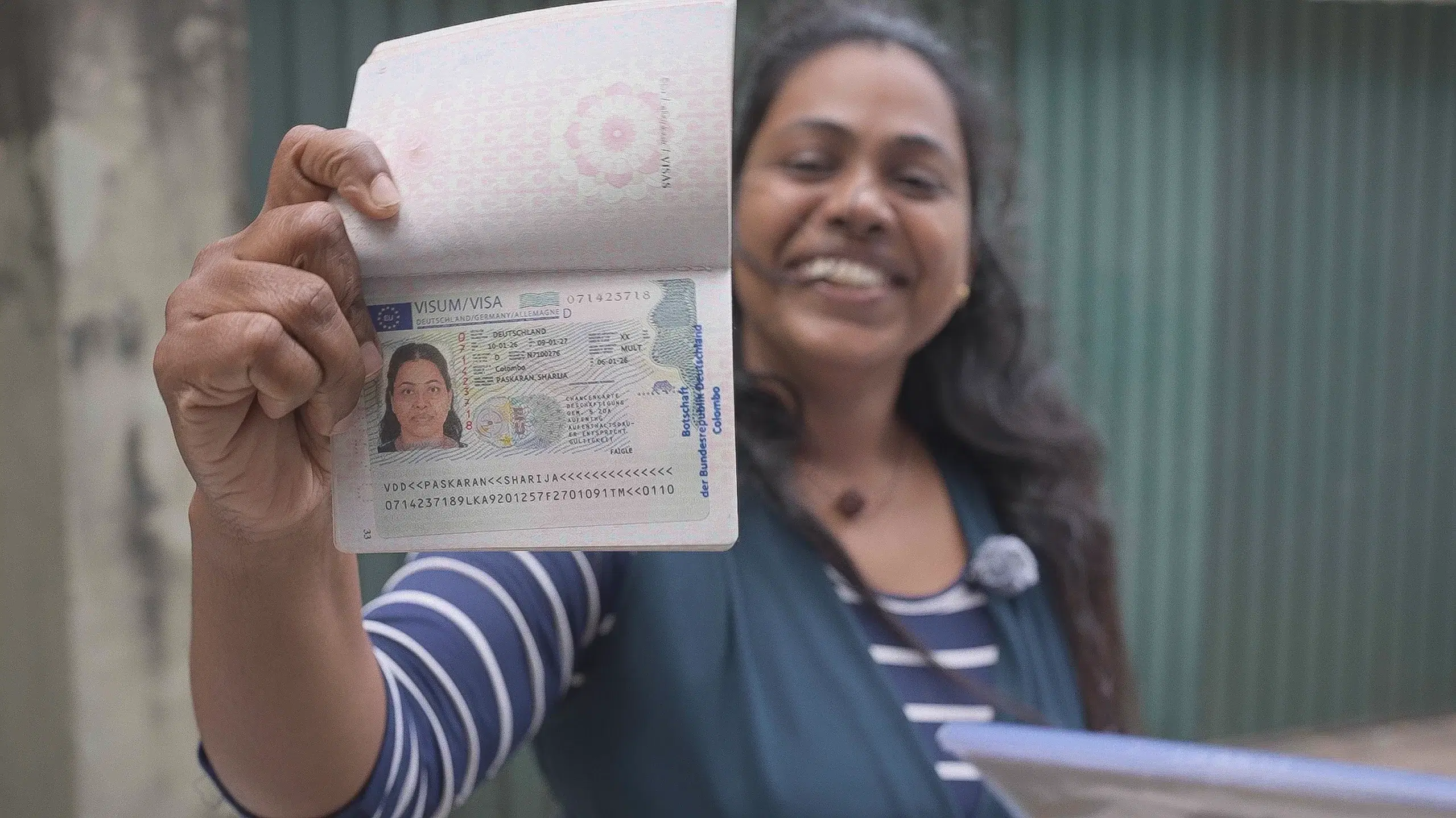 Client holding German visa